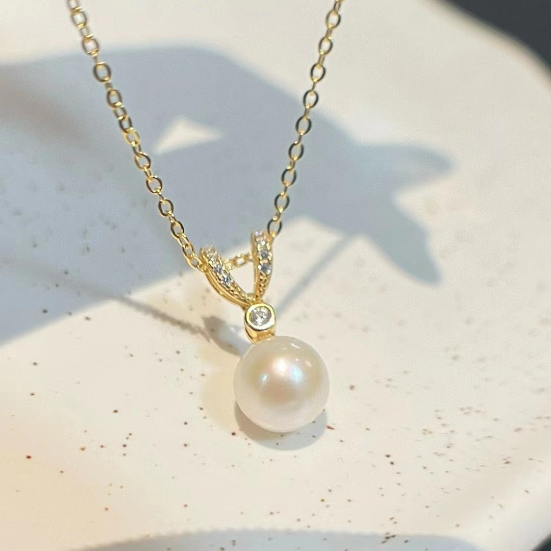 Gold plated pearl pendant