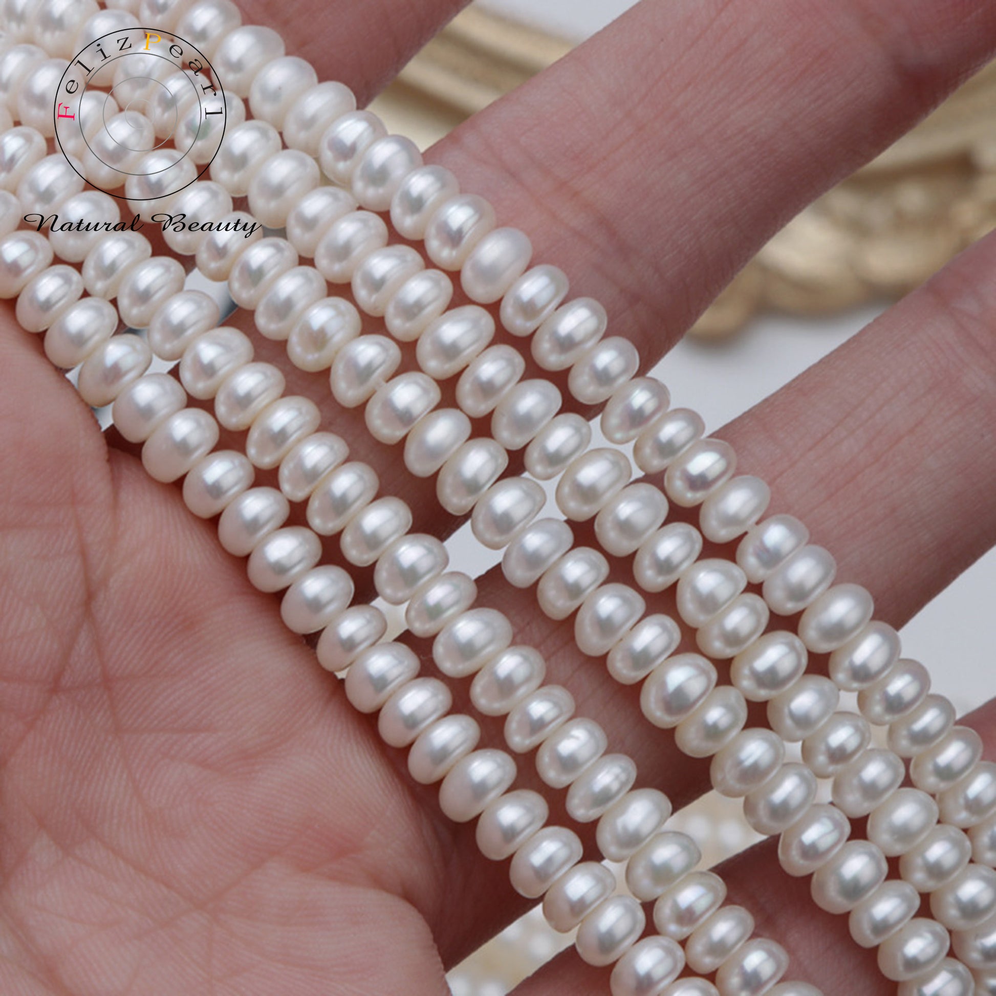 high luster freshwater button pearl strands